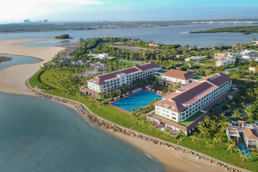 Aerial view of Renaissance Hoi An Resort & Spa with pool and beach on waterfront