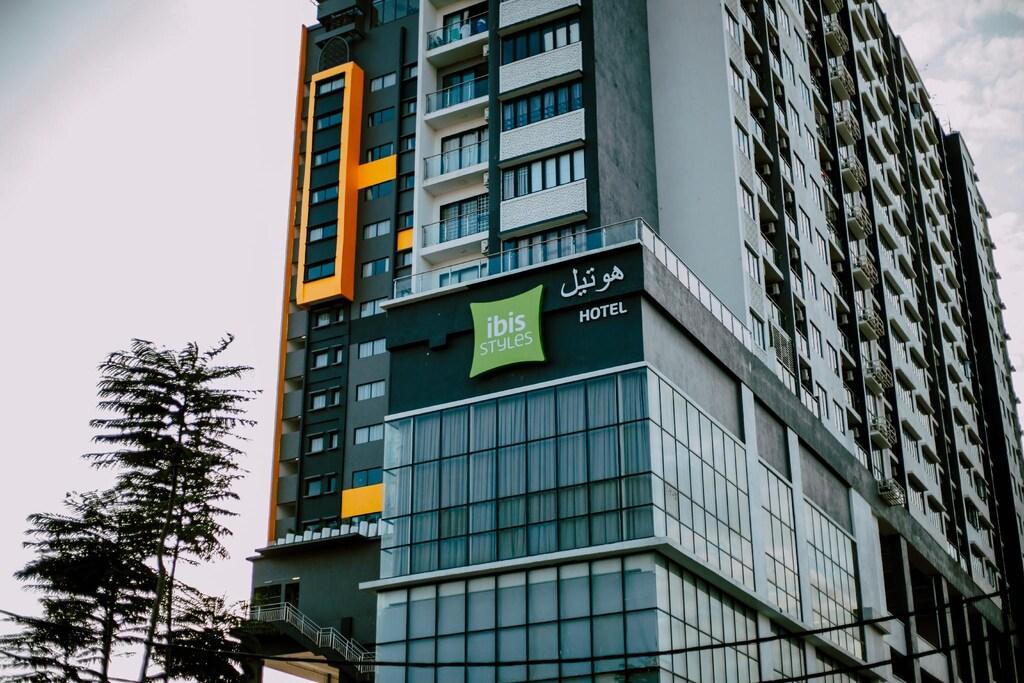 Exterior of ibis Styles Kota Bharu hotel building with balconies and signage